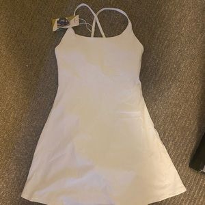 White athletic dress never worn still has tags